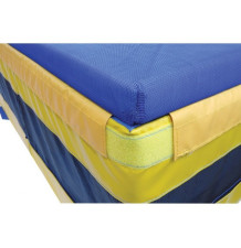 School training high jump landing pad with a spike-proof blanket