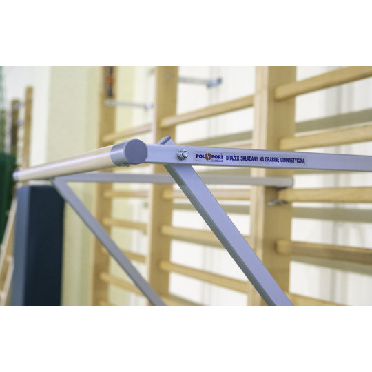 Foldable gymnastic bar attached to a gymnastic ladder